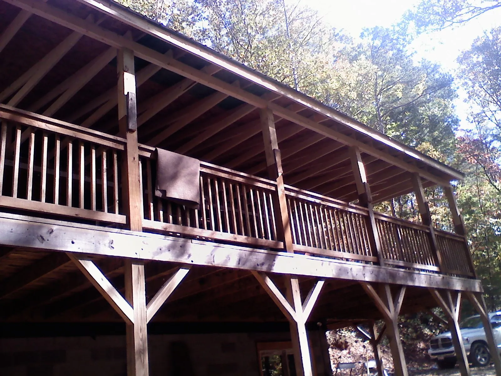 Timber framing under a new elevated porch and deck — Roof Leak Repair in Mulvane by Roofing Brothers